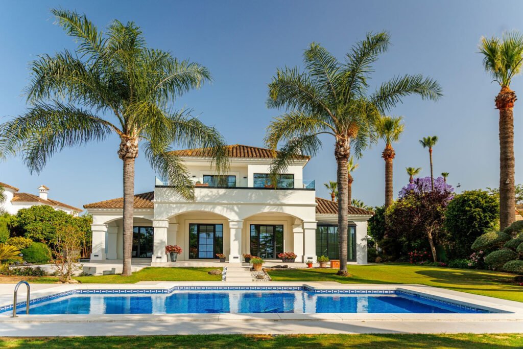Luxury villa in Sotogrande with private pool, palm trees and landscaped garden