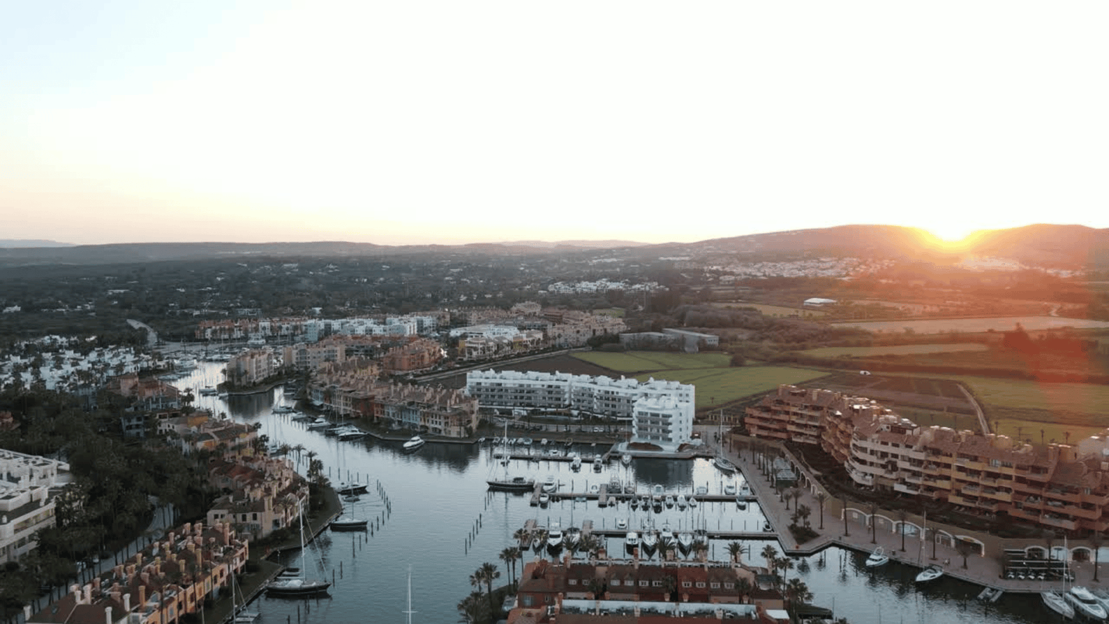 Aerial view of Sotogrande marina, luxury property and Mediterranean coastline